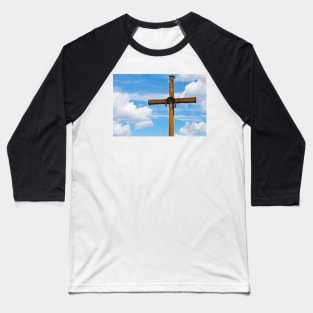 Figurine of Jesus Christ on a wooden cross against under blue cloudy sky Baseball T-Shirt